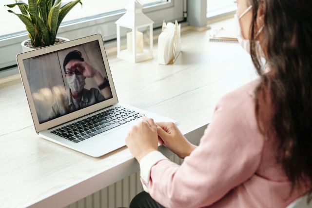 Woman Using Her Laptop On Video Call